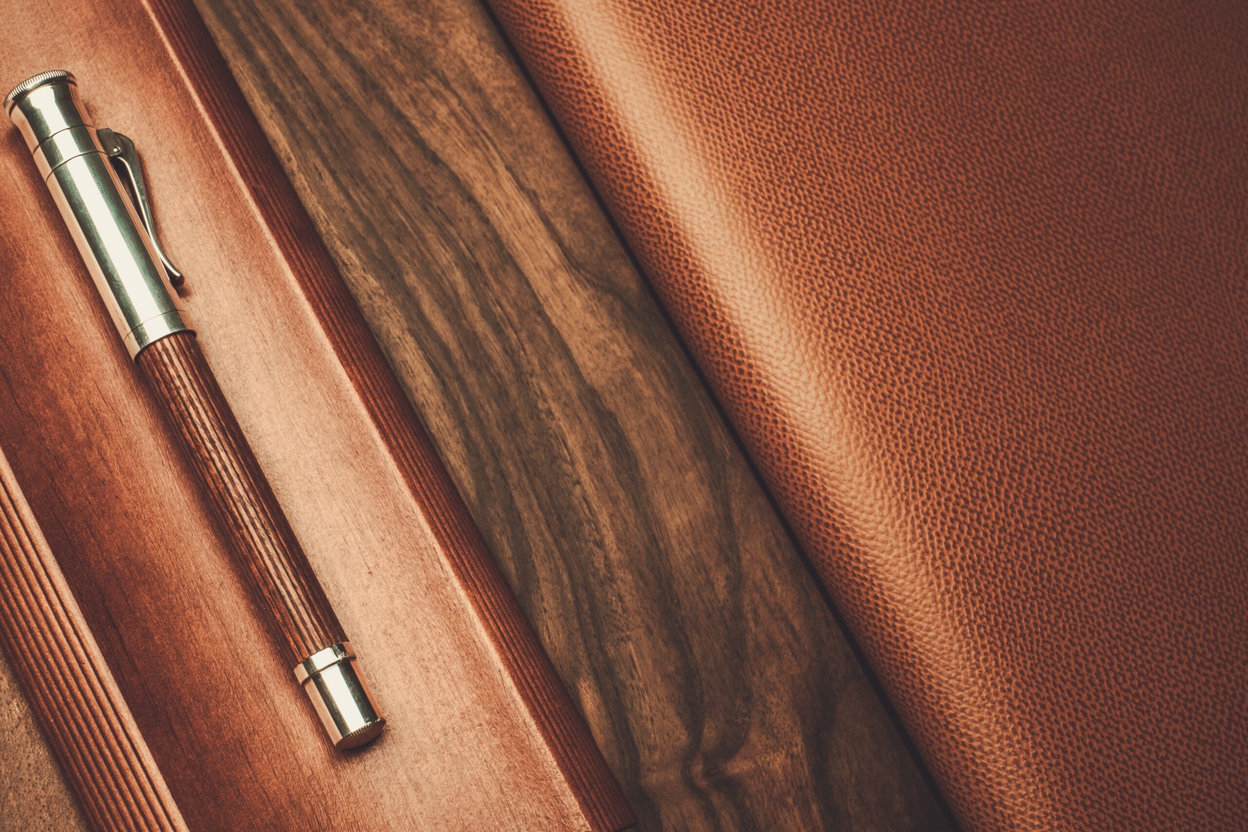 Pen on wooden background